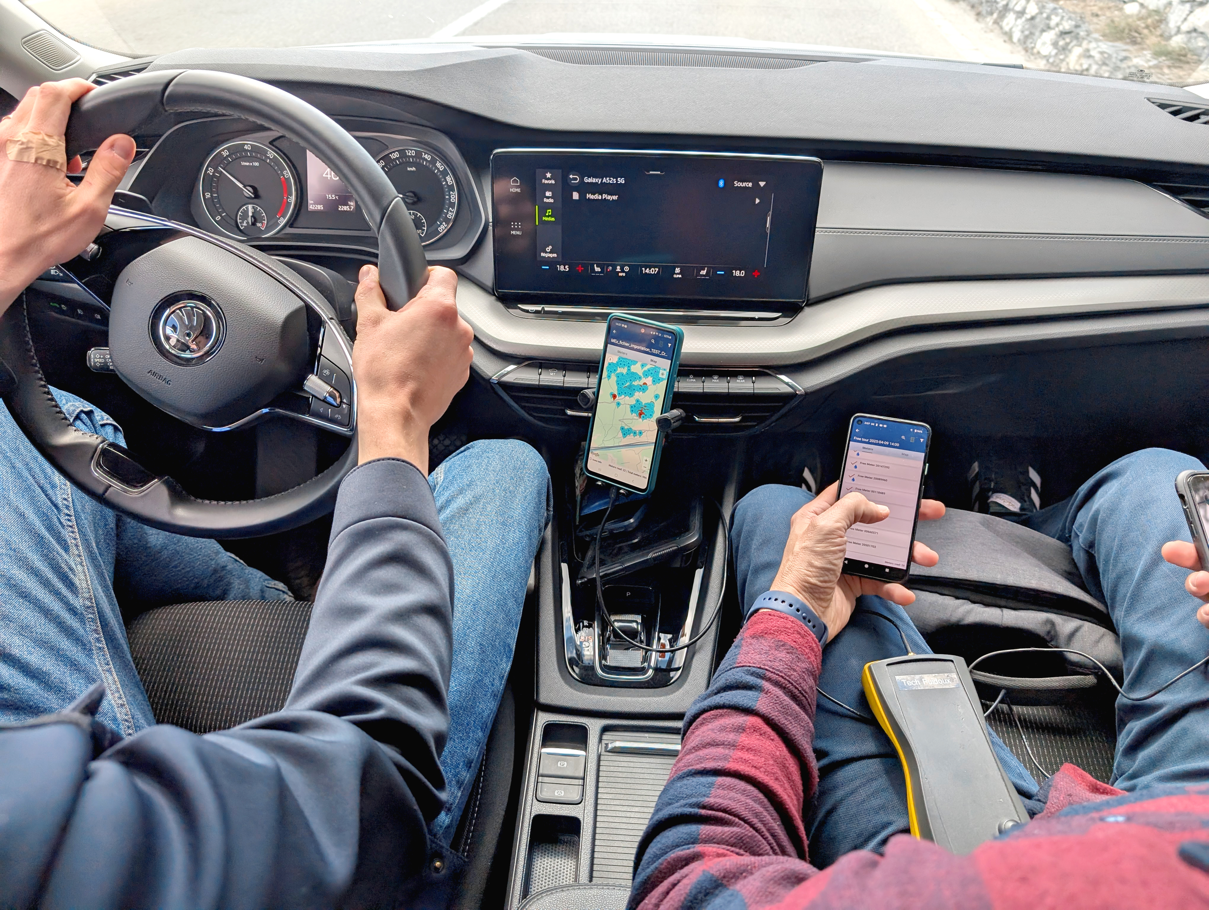 User operates mobile app in vehicle – digital connectivity in everyday life